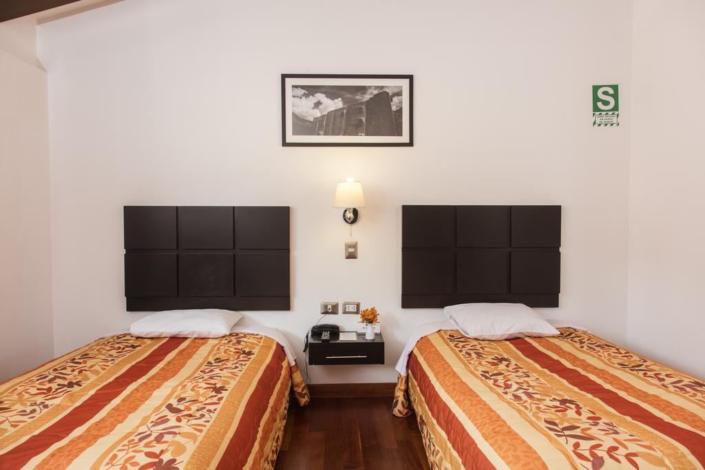 Hostal & Apartments El Triunfo Куско Екстериор снимка